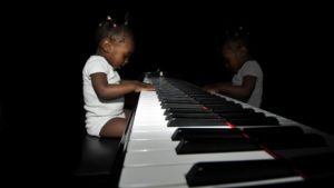 baby-grand-piano-playing